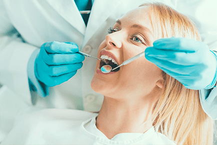 Dentist examining a patient